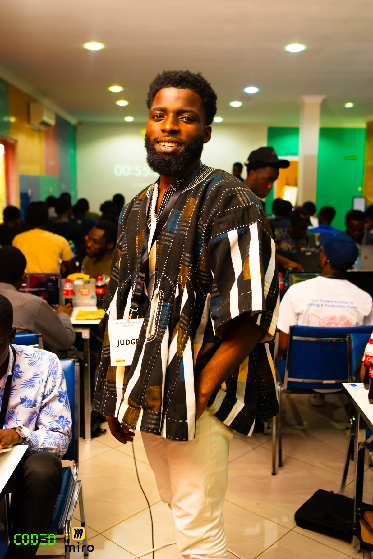 An attendee standing in the CODED event room